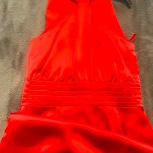 Woman’s new red dress. Cocktail. Formal.